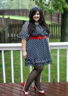 Blue dress with polka dots with a red belt and shoes for the plump