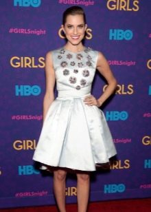 Dress with a peaked skirt for a figure Slender column