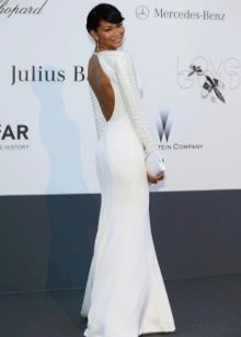 Long white dress with long sleeves and open back