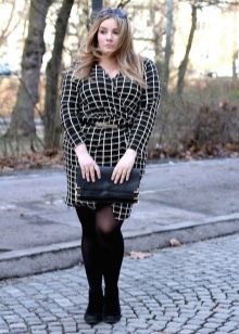 Black dress in a cage with a wrap for obese women
