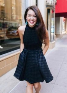 Black dress in black cage with a half-sun skirt