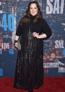Black floor-length dress with long sleeves for the full