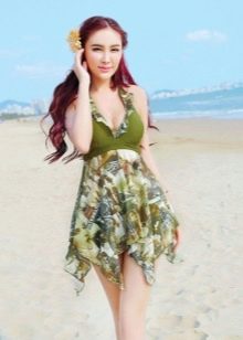 Bathing dress with asymmetric skirt