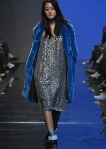 Fur coat under an autumn dress