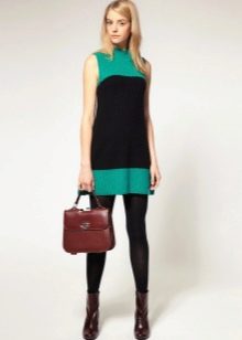 Short 60s two-tone a-line dress paired with rude boots
