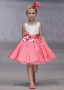 Short dress in retro style with a fluffy skirt for a girl