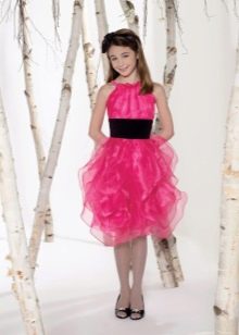 Elegant evening dress for a girl with a voluminous skirt