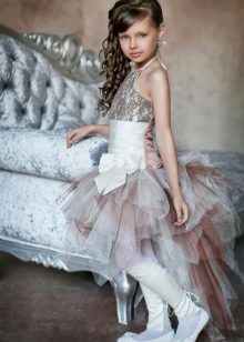 Elegant short dress with a train for a girl