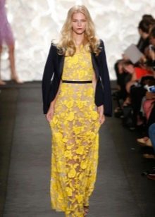 Yellow lace dress with black accessories