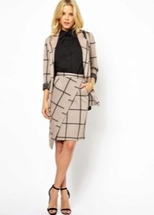 Asymmetric skirt with turtleneck and jacket for the office