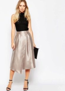 Shiny asymmetric skirt
