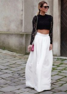 Long white semi-sun skirt combined with a black top