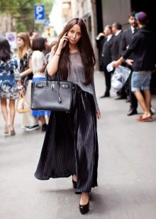 floor-length black pleated skirt