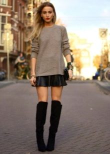 Leather skirt sun combined with suede over the knee boots
