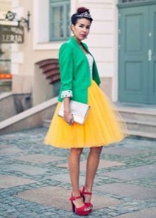 Layered yellow skirt combined with a jacket