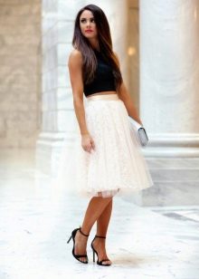 Layered skirt paired with heeled sandals