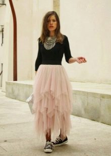 Long layered skirt combined with sneakers