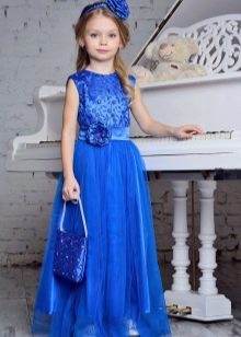 Blue New Year's dress for a girl on the floor