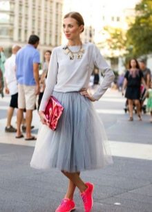 midi skirt and sporty outfit
