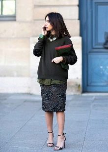 Below the knee skirt in combination with a long blazer