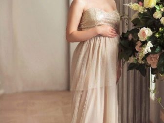 Beige dress for hire for a pregnant woman for a photo shoot