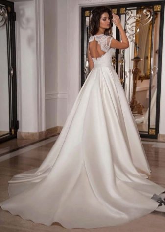 Lush wedding dress with a train of silk