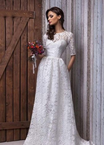 Lace wedding dress with closed milestone