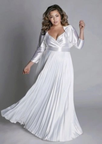 Evening dress for plump with a pleated skirt