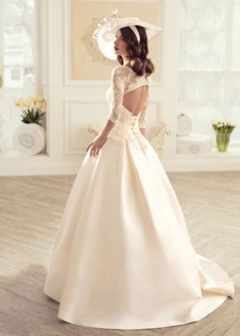 Wedding dress with a cutout on the back from the Tatiana Kaplun's collection Burnt by luxury