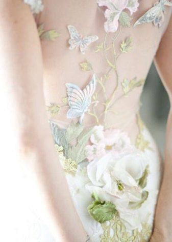 White wedding dress with green accents