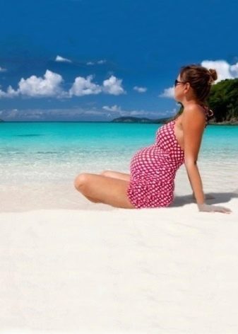 Red summer dress with white polka dots for pregnant women