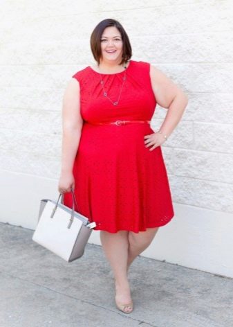 Red sleeveless dress for obese women with an A-shaped silhouette under a red strap