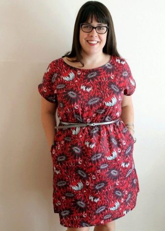 Straight red dress from a staple with, moreover, on a strap for overweight