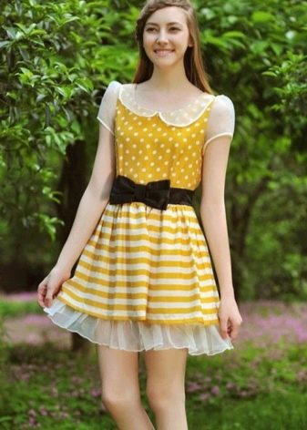 Polka dot yellow dress with black sash