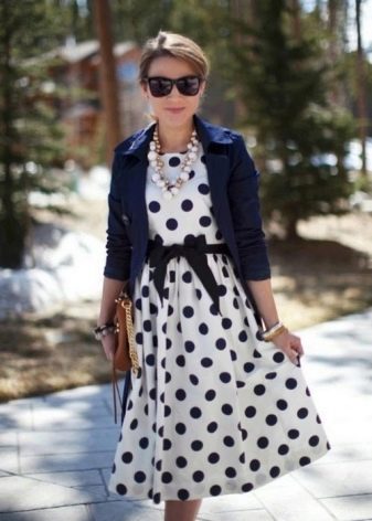 White dress with black polka dots with black belt
