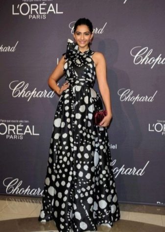 Black long dress with large and small white polka dots