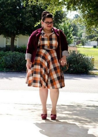 Plaid dress for obese women in combination with a cardigan