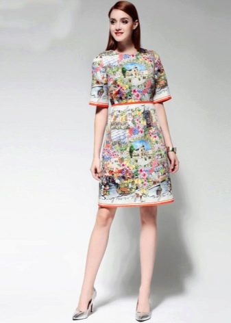 Fashionable dress for the spring-summer 2016 season with prints and inscriptions