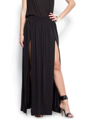 long black skirt with graceful sandals