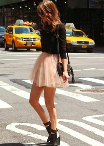Short fluffy skirt combined with a jumper