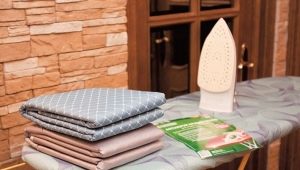 How to choose and correctly change the ironing board cover?