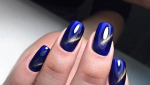 Cat's eye manicure in blue shades