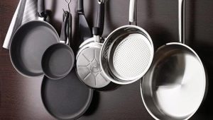 How do I prepare a new pan for use?