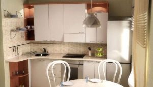 Kitchen design in Khrushchev with a refrigerator