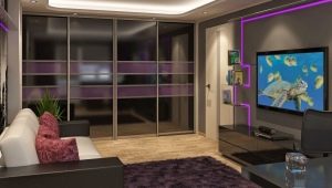 Sliding wardrobe in the living room: types, choices and options in the interior
