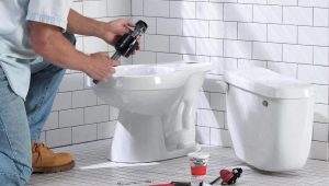 At what distance from the wall should the toilet be placed?