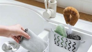 How do I organize the storage of dishwashing sponges in the kitchen?