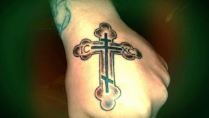 Tattoo in the form of an Orthodox cross