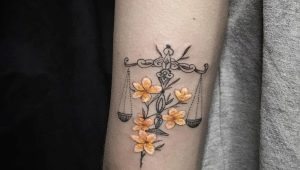Libra zodiac sign tattoo