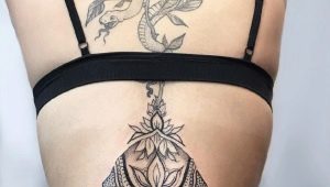 Women's lower back tattoos